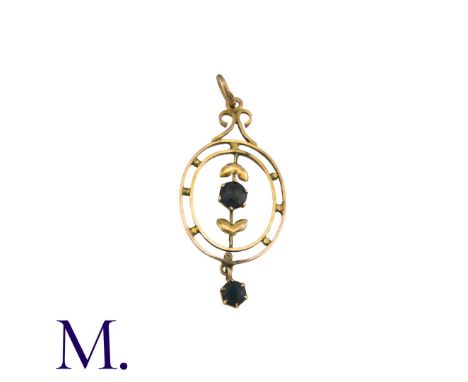 A Blue Stone Pendant in 9k yellow gold, the open work foliate and scrolling form set with a round cut blue stone, suspending 