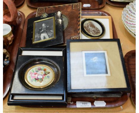 ^ Tray including three rosewood framed portraits, a walnut and parquetry decorated frame, portrait of a gentlemen, a porcelai
