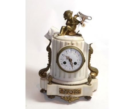 A 19th century French white marble and gilt metal mantel clock of column form surmounted by a cherub holding bow and arrow, t