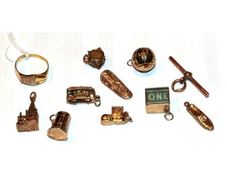 A 9 carat gold T-bar; four 9 carat gold charms including a football and a boot; two charms stamped '375'; a ring, stamped '58