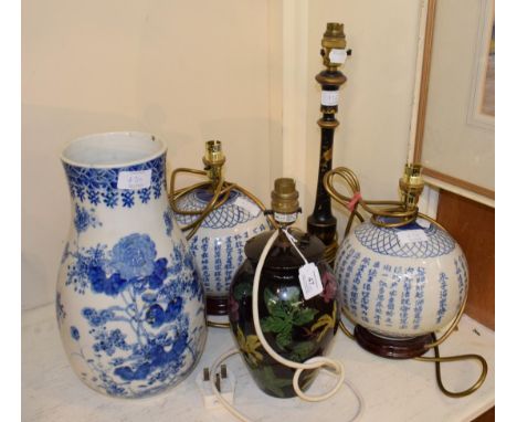 ^ A group of modern chinoiserie table lamps, including a pair of globular ceramic blue and white bases with character mark de