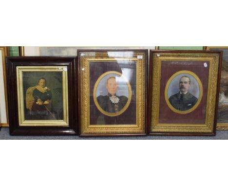 A pair of early 20th century overpainted portrait photographs, lady and gentleman, in good gilt and gesso frames, 24cm diamet
