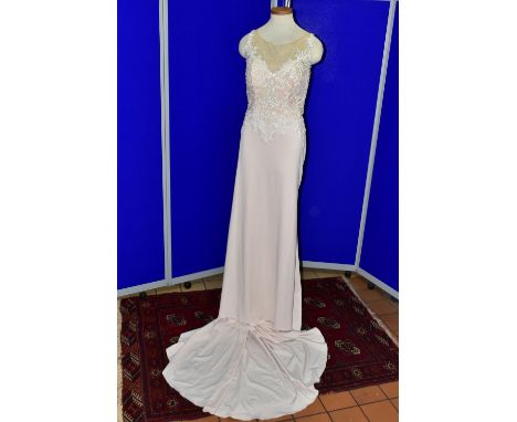 WEDDING DRESS, end of season stock clearance (may have slight marks) size 18, nude coloured A line dress with a pearl buttone