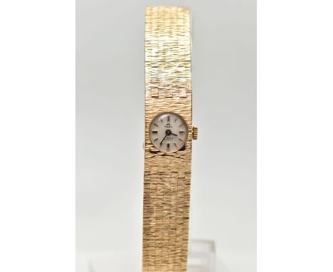 A LADY'S 9CT GOLD 'TIARA' WRISTWATCH, manual wind, round silver dial signed 'Tiara, 17 jewels Incabloc', baton markers, black