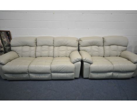 A CREAM LEATHER MANUAL RECLINER TWO PIECE LOUNGE SUITE, comprising a three seater settee, length 222cm, and a two seater sett