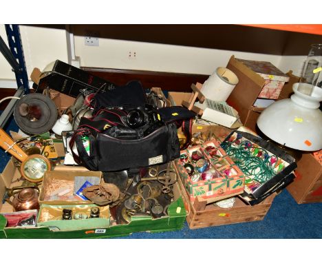 SIX BOXES OF MISCELLANEOUS SUNDRIES, to include an original set of used horse brasses, bit and part of a head ornament, a box