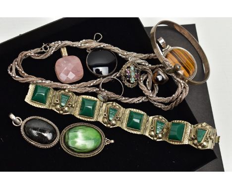 A COLLECTION OF SILVER AND WHITE METAL GEM SET JEWELLERY, to include a tiger's eye bangle, Swedish hallmarks, 1973, sponsors 