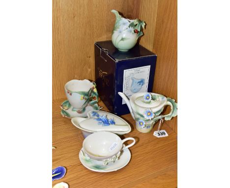 A GROUP OF FRANZ PORCELAIN, comprising a boxed Ladybug cream jug FZ00400 (part of leaf handle missing, rim chipped, boxed has