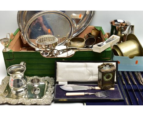 A BOX OF ASSORTED WHITE METAL WARE, to include a large oval tray, a smaller oval tray, an embossed detailed rim tray, a cased