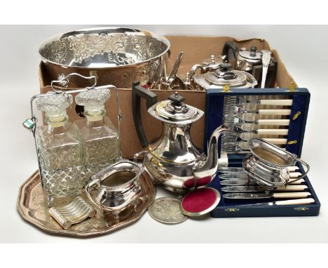 A BOX OF ASSORTED WHITE METAL WARE, to include a large punch bowl, a pair of glass decanters with white metal stand, a cased 