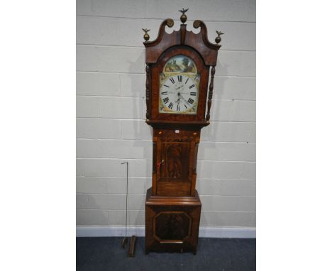 A GEORGIAN FLAME MAHOGANY AND CROSSBANDED 30 HOUR LONGCASE CLOCK, the hood with a swan neck pediment, three finials, turned p