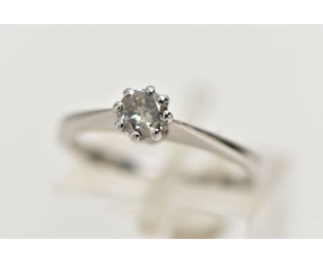 A MODERN WHITE METAL DIAMOND SINGLE STONE RING, set with a round brilliant cut diamond, eight claw set, to the plain polished