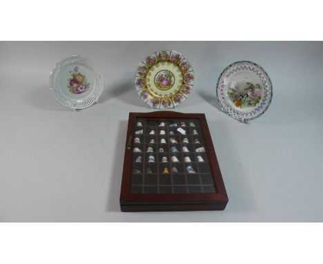 A Cased Collection of Ceramic Souvenir Thimbles and Three Decorated Plates 