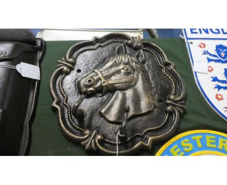 A Wall Mounting Bronze Effect Coat Hanger with Horses Head Decoration in Relief (Plus VAT), 30cm high 