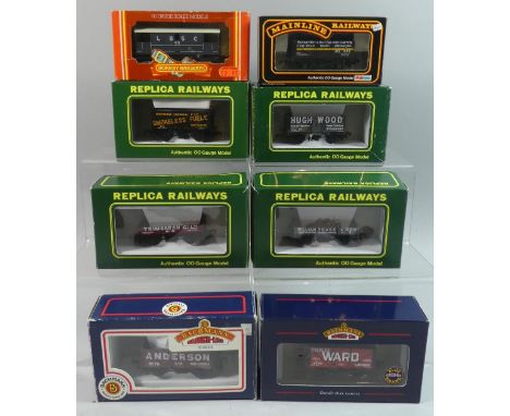 A Collection of Eight Boxed OO Gauge Goods Wagons by Replica Railways (4), Bachmann(2), Mainline (1) and Hornby (1) 