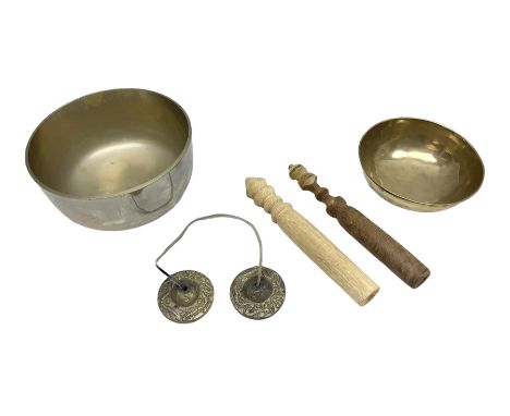 Two Himalayan singing bowls, to include a high wall example, together with Tibetan Tingsha cymbals and two wood hammers, larg