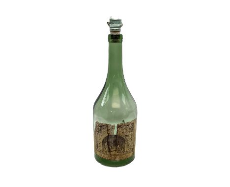 Chateau Paulet cognac green glass bottle, with blue ceramic stopper and paper label bearing 'Chai de Reserve Du Chateau Paule