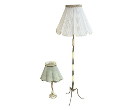 Floor lamp with brass and onyx central column, together with a table lamp, both with pleated pale blue fabric shades, largest