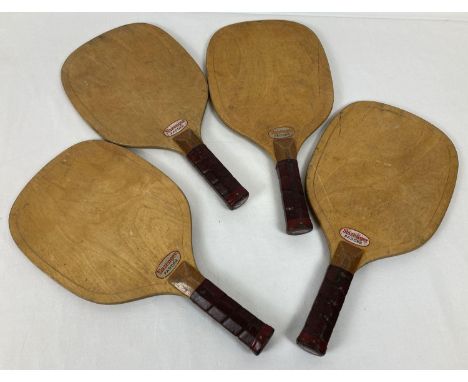 A set of four vintage wooden Slazenger Padders tennis bats.  