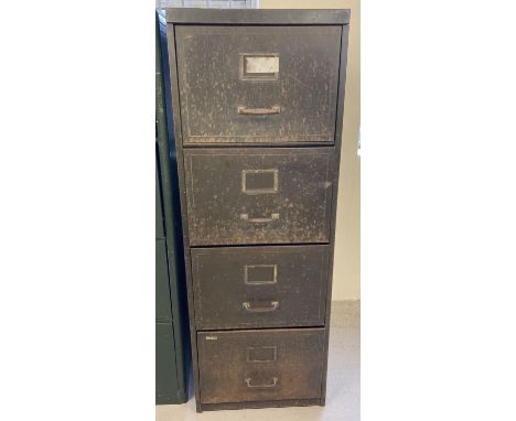 A vintage green painted 4 drawer metal filing cabinet.  Approx. 131 x 47 x 65cm.