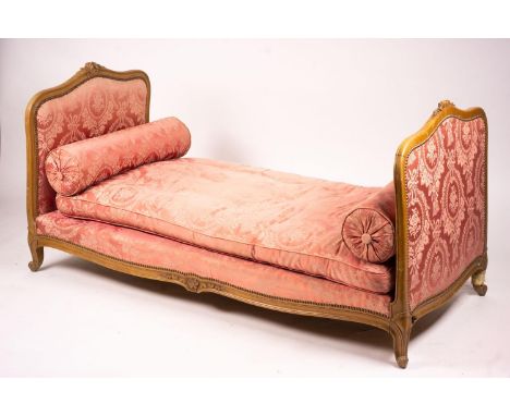 An early 20th century French carved beech daybed, length 174cm, depth 80cm, height 88cm