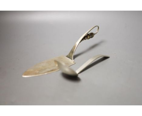 A O. Mogensen sterling cake slice, design no. 35, 25cm and a Georg Jensen sterling sauce ladle, 16cm, 5.5oz.