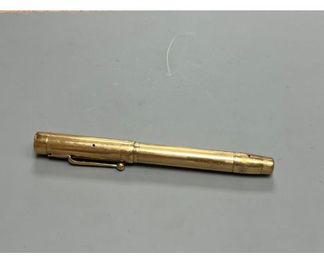 A Swan engine turned 9ct gold fountain pen