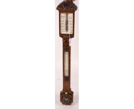 A Victorian carved walnut stick barometer by Chadburn Bros., Sheffield, height 104cm