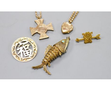 A Scottish yellow metal cross pendant on a 9c chain, a similar heart locket on a gilt metal chain, a Chinese 9k pendant brooc