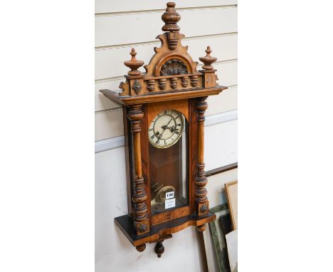 A small late 19th century Vienna wall clock, fitted with an eight day striking movement