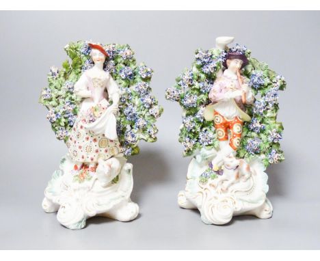 A pair of Derby bocage figures, c.1775, patch marks, 24.5 cm high, damage