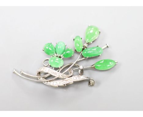 A white metal (stamped Plat), jade and diamond cluster set spray brooch, 50mm, gross weight  11.8 grams.