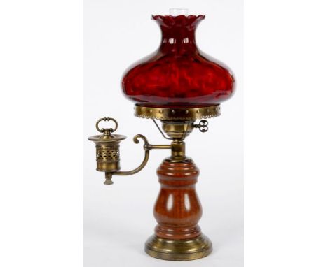 A BRASS MOUNTED AND TURNED WOOD LAMP, IN THE FORM OF A 19TH C OIL LAMP WITH REEDED GLASS SHADE, 51CM H, 20TH C