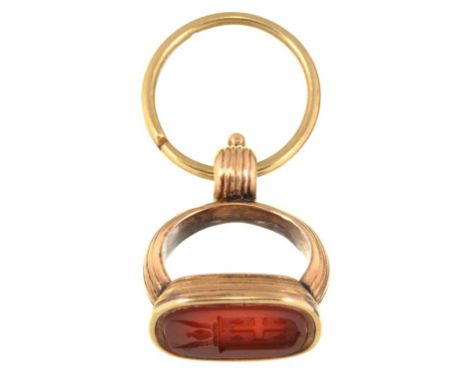 A CORNELIAN INTAGLIO FOB SEAL IN GOLD, UNMARKED, 9.95G++SLIGHT BUILD UP OF DIRT AND GRIME; INTAGLIO CARVING IN GOOD CONDITION