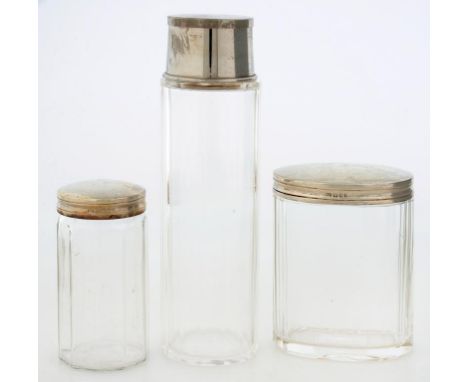 TWO GEORGE V GLASS JARS FROM A TOILET SERVICE, WITH PLAIN SILVER COVER, LONDON 1935 AND ANOTHER ITEM