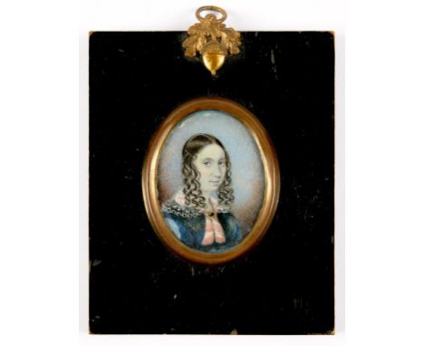 ENGLISH SCHOOL, 19TH C, PORTRAIT MINIATURE OF A YOUNG WOMAN, OVAL 5.5 X 4.5CM, PAPIER MACHE FRAME WITH BRASS HANGER