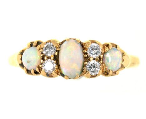 AN OPAL AND DIAMOND RING IN GOLD, MARKED 18CT, MAKER'S MARK RE&S, 3.4G, SIZE P++GOOD CONDITION