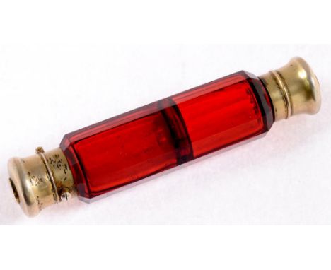 A VICTORIAN SILVER GILT MOUNTED RUBY GLASS COMBINATION SCENT - SALTS BOTTLE BY S MORDAN AND CO, LONDON CIRCA 1880