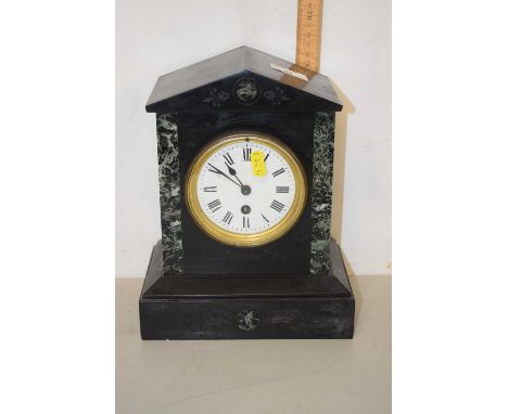 A Victorian black slate mantel clock