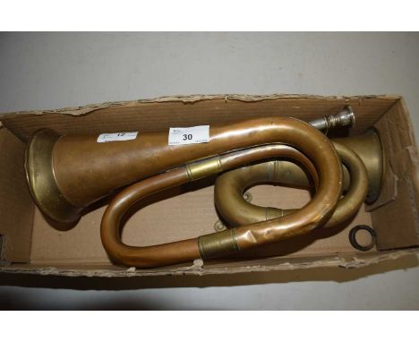 A vintage copper bugle and a further car horn
