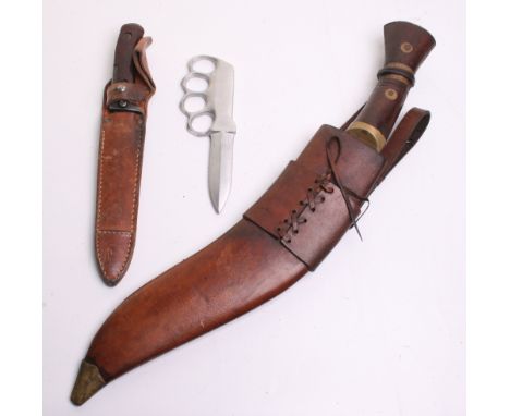 Large Indian Made Kukri, wooden and brass decorated grip. Curved single edged blade with various stampings and War Department