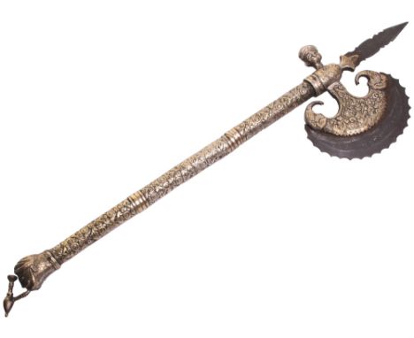 A Decorative Indian Axe, crescent head 13cms with serrated edge and tip, cast brass mounts and haft incorporating a pair of i