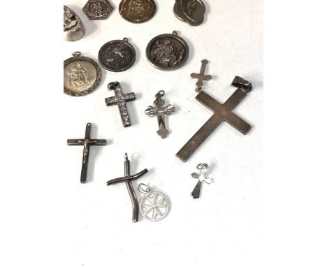 Selection of vintage silver crosses and st christopher pendants etc weight 48g 