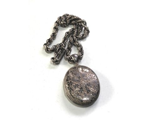 Large vintage silver locket and chain engraved initilas measures approx 5.8cm drop by 34mm wide weight approx 36g xrt tested 