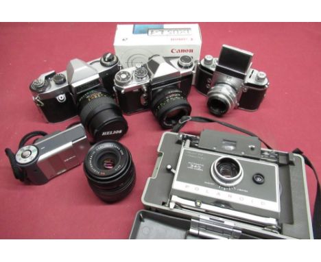 A box of various cameras including an Edixa Prismaflex, Canon Ixus L-1, Polaroid 340 etc 