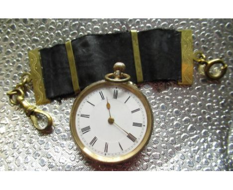 Continental 14k gold top wind ladies fob watch, white enamel Roman dial with gilt hands, engraved case back stamped 14K, on g