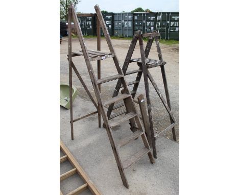 Two sets of wooden step ladders, one labelled Ford Products, small three rung ladder (3) 