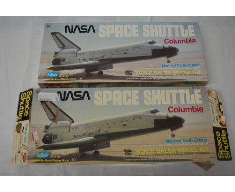 Two Guillow's space shuttle Columbia scale 1/77 model kits (one box missing its bottom but all contents appear to be present)