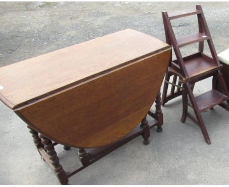 C20th oak gate leg dining table on barley twist legs W107cm H157cm H76cm max, pair of library steps (2)