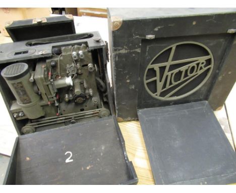 Cased Victor 16mm cine projector 1740 together with matching Victor cased loud speaker 